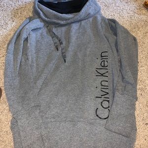 Grey Calvin Klein sweatshirt with a sweater neck
